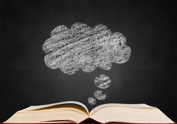 Dream sign on blackboard popup from book — Stock Photo, Image