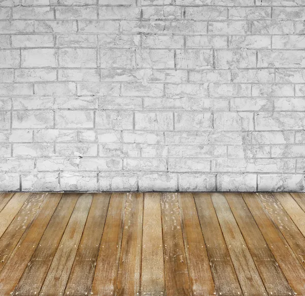 Τούβλο grunge λευκό τσιμέντο τοίχο και κίτρινο ξύλινο πάτωμα — Φωτογραφία Αρχείου