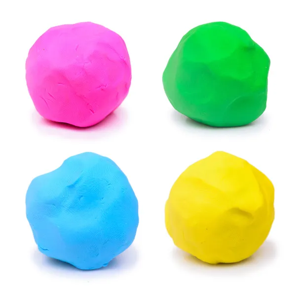 Colorful pink green blue and yellow plasticine clay on white background — Stock Photo, Image