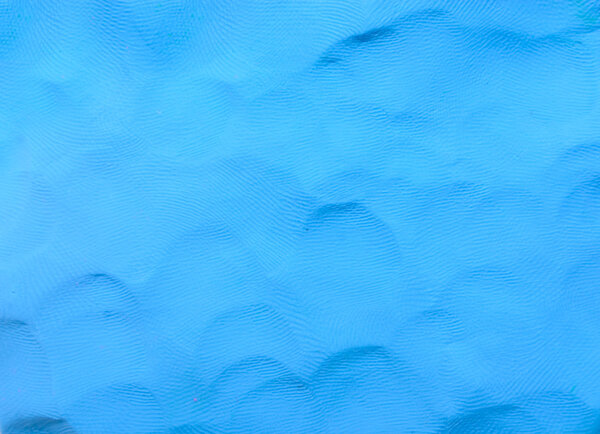Colorful blue plasticine clay background