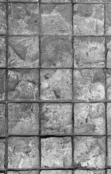 Grunge piedra ladrillo piso fondo — Foto de Stock