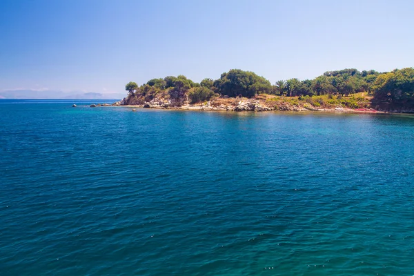 Pôr do sol sobre a ilha de Corfu — Fotografia de Stock