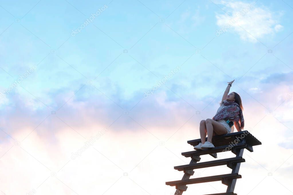 Happiness of girl on top of stair with happy new year 2022 concept