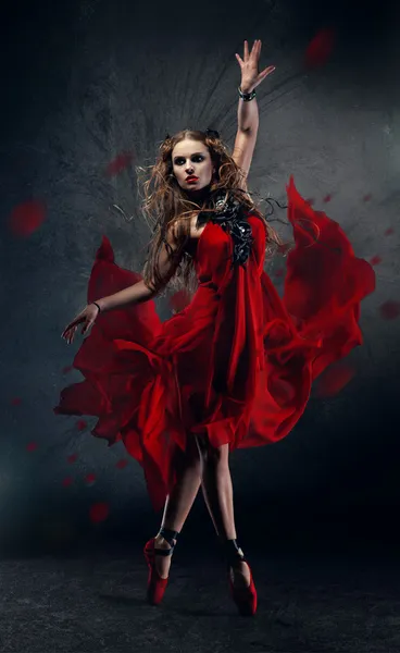 Flamenco dancing woman in red dress — Stock Photo, Image