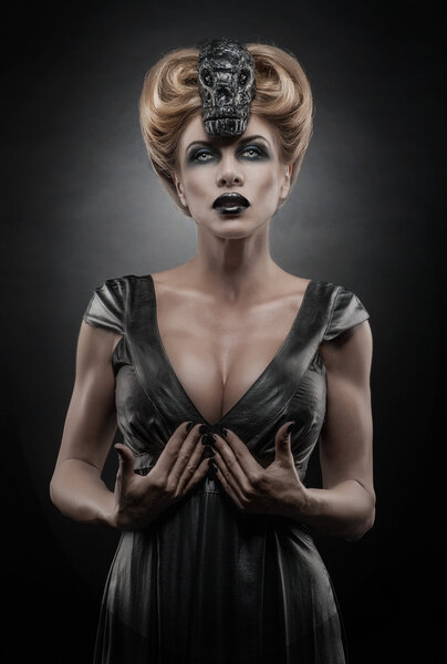 Gothic blond vampiric woman