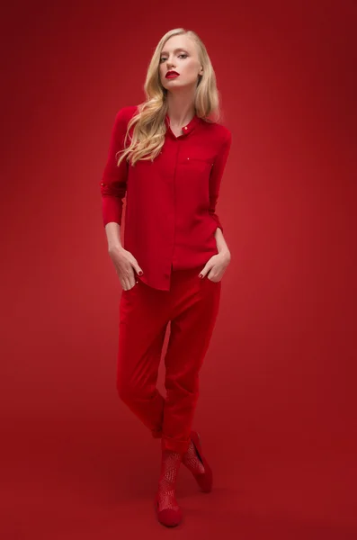 Stylish woman in red suit — Stock Photo, Image