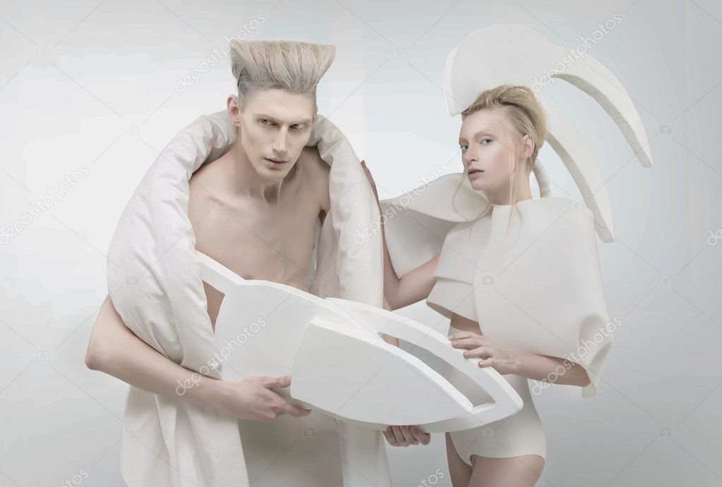 Pale futuristic blonde couple