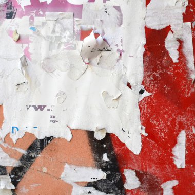 Torn advertisement posters