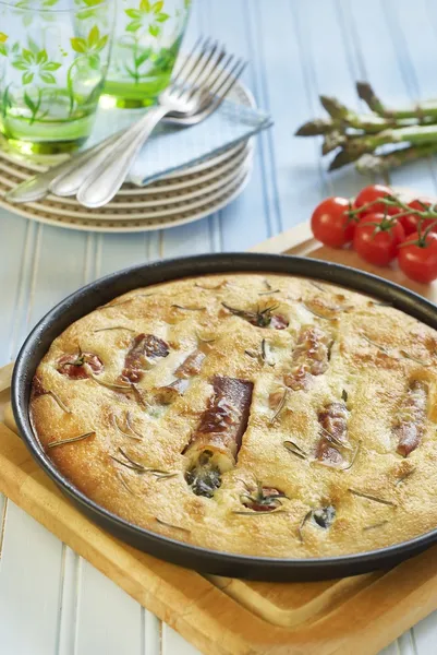 Focaccia with rosemary, asparagus in jamon and cherry tomatoes — Stock Photo, Image