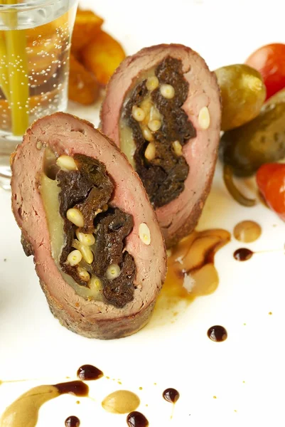 Beef rolls with prunes, cheese and nuts — Stock Photo, Image