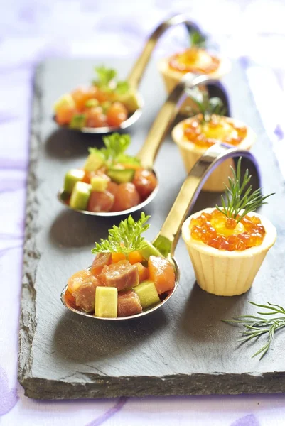 Holiday starter platter with fish appetizers — Stock Photo, Image