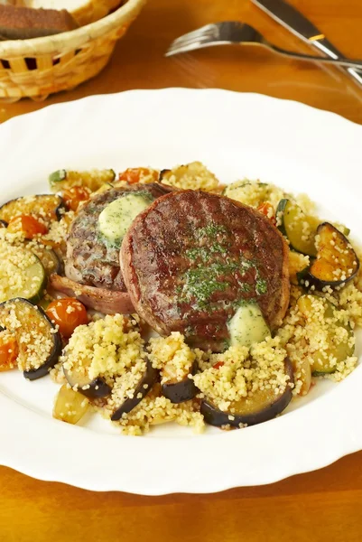 Filet mignon with couscous and vegetables — Stock Photo, Image