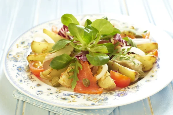 Potato salad with sea bass and salmon — Stock Photo, Image