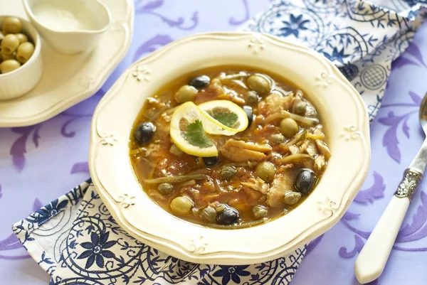 Fish solyanka with capers and olives — Stock Image Fish solyanka with capers and olives Stock Photo