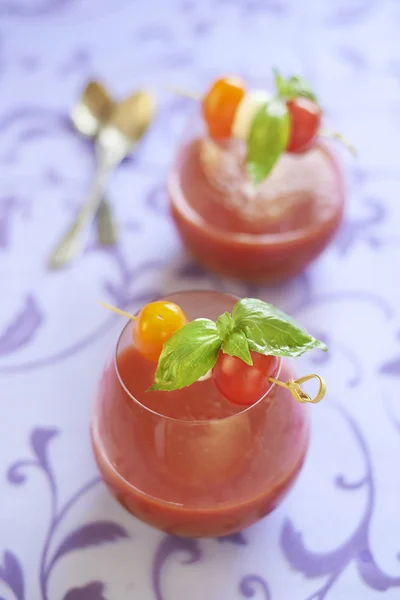 Tomato soup with mozzarella and basil — Stock Photo, Image