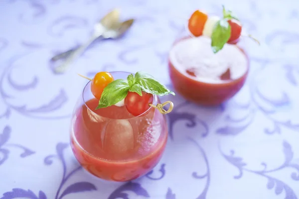 Tomato soup with mozzarella and basil — Stock Photo, Image