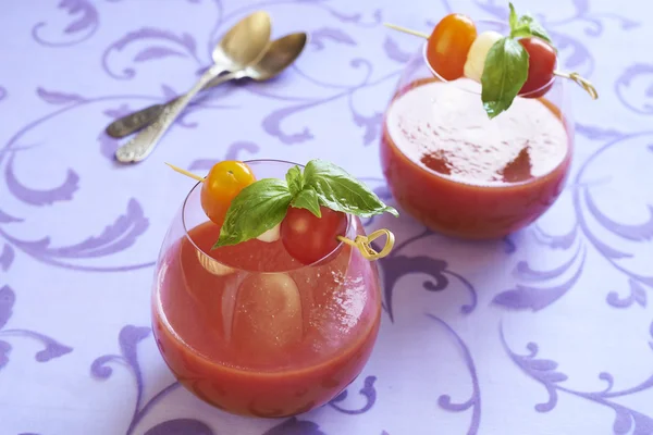 Tomato soup with mozzarella and basil — Stock Photo, Image