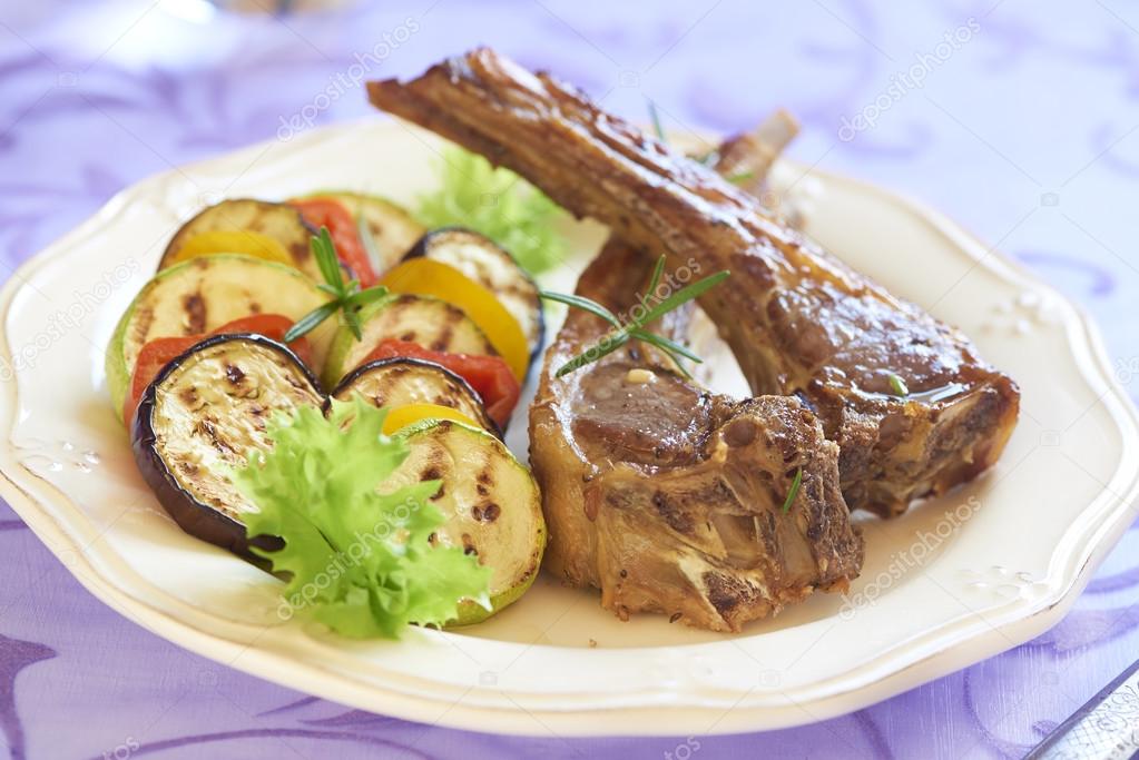 Fried lamb with vegetable garnish