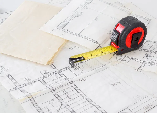 Architectural plans of the old paper and measuring tape — Stock Photo, Image