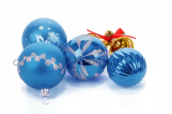 Blue christmas balls and small golden bells — Stock Photo, Image