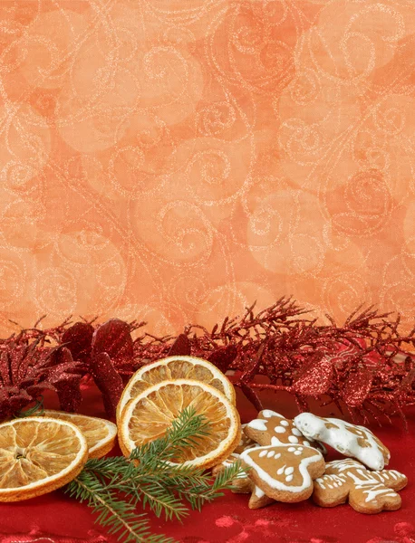 Orange slices and gingerbreads — Stock Photo, Image