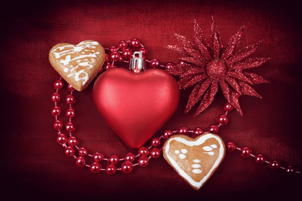 Valentine hearts with flower on red background — Stock Photo, Image