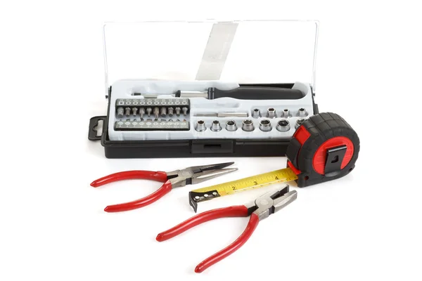 Caja de herramientas de destornillador con juego de brocas, alicates y cinta métrica —  Fotos de Stock