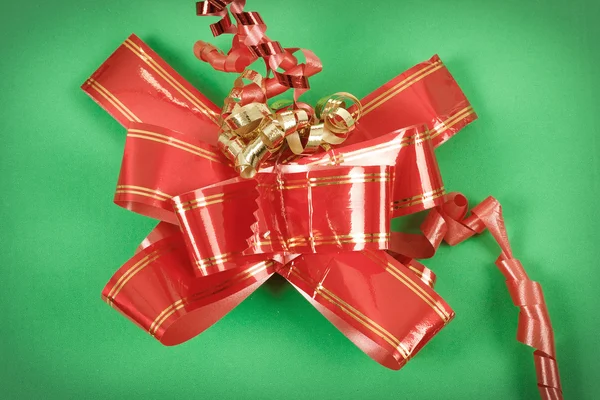 Red ribbon on gift — Stock Photo, Image