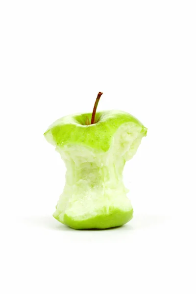 Zelená pokousaný apple izolovaných na bílém — Stock fotografie