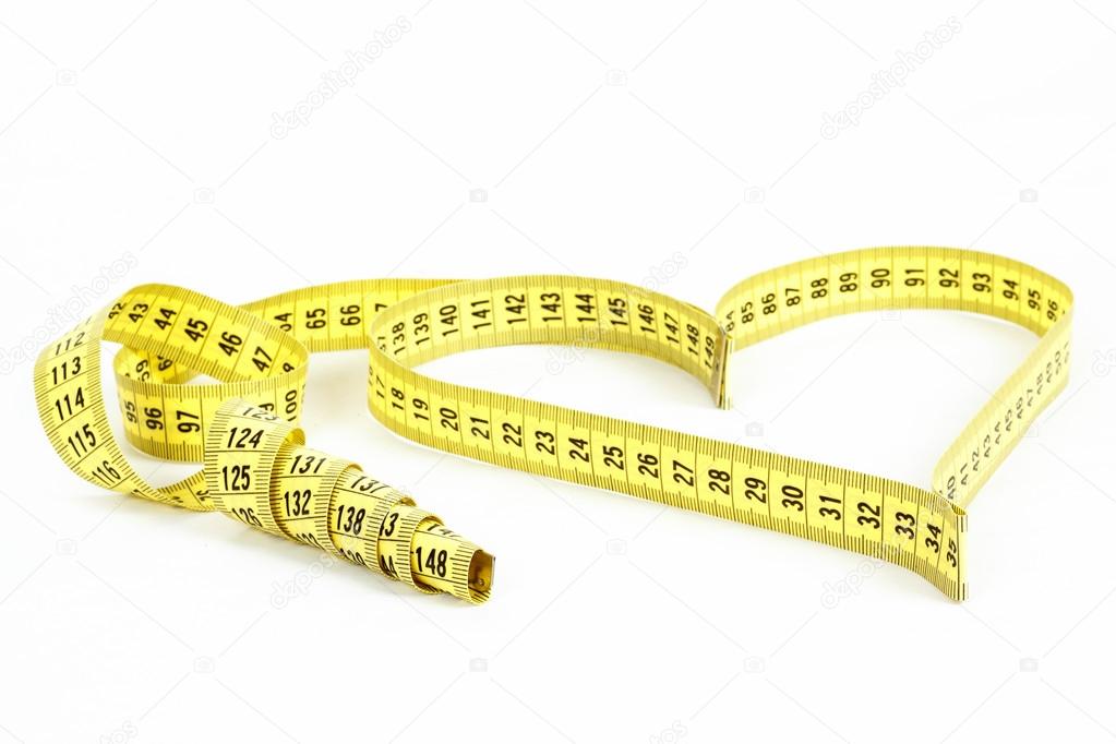 Tape measure heart shape - health, weight concept
