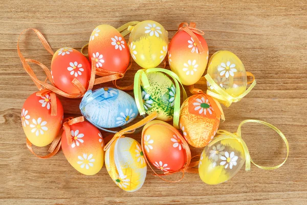 Bright color easter eggs with bows — Stock Photo, Image