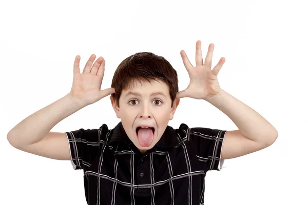 Young boy grimacing — Stock Photo, Image