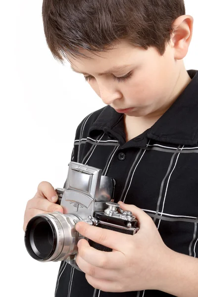 Young boy with old vintage analog SLR camera — Stock Photo, Image