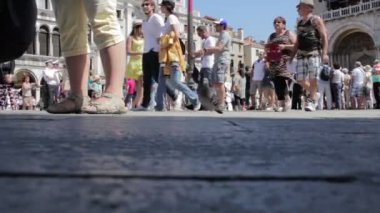 Crowd of tourists on most famous square July 16, 2012 in Venice
