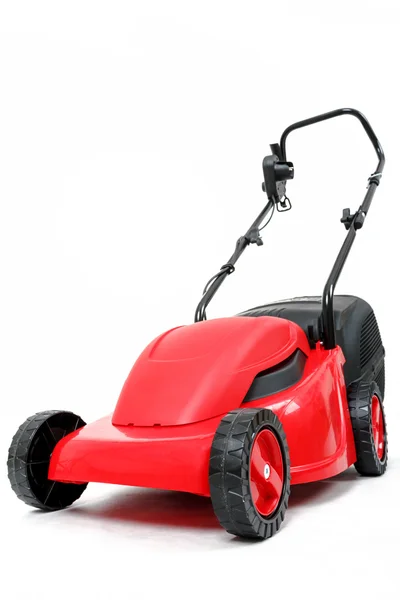 New red lawnmower on white background — Stock Photo, Image