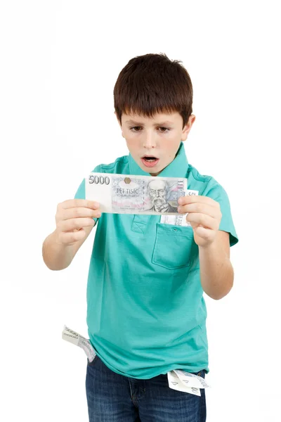 Amazed boy looks at the bill — Stock Photo, Image