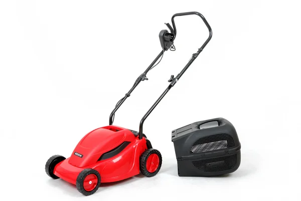 New red lawnmower on white background — Stock Photo, Image
