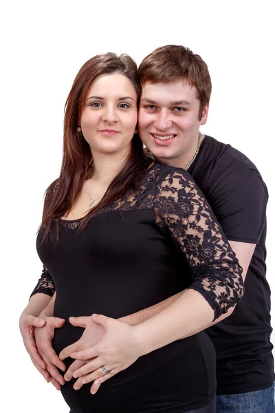 Loving happy couple, pregnant woman with her husband, isolated o — Stock Photo, Image