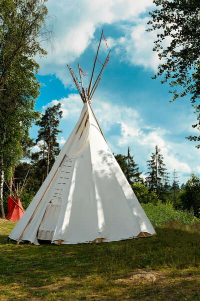 indian tepee against blue sky