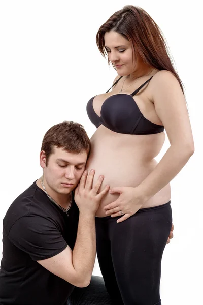 Loving happy couple pregnant woman with her husband Stock Image