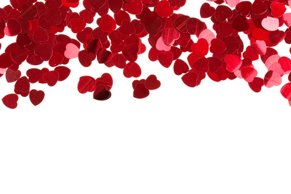 Red hearts confetti on white background — Stock Photo, Image