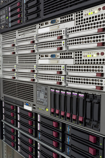 servers stack with hard drives in a datacenter