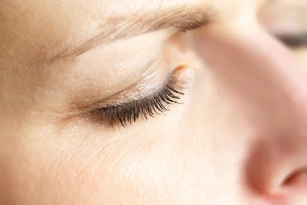 Middelbare leeftijd vrouw oog macro — Stockfoto