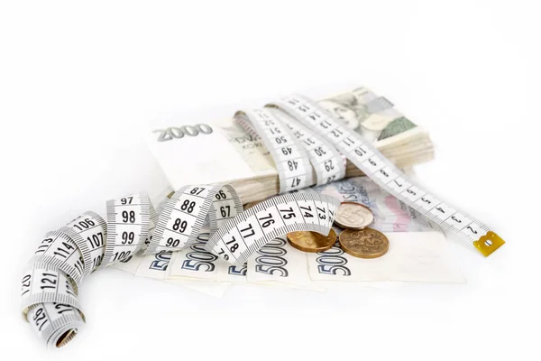 Money concept of expensive bill with measurement tape — Stock Photo, Image