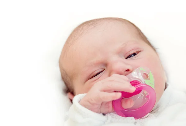 Schattige baby met fopspeen — Stockfoto