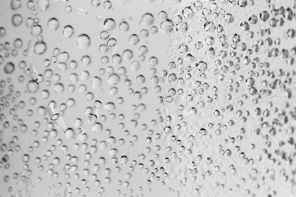 Makro třpytu vody kapky sklo — Stock fotografie