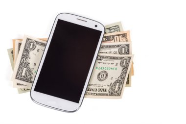 beyaz üzerine para ve cep telefonu