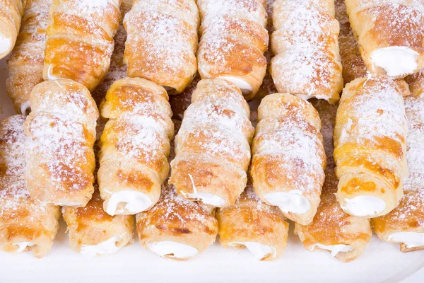 Tube of pastry filled with snow — Stock Photo, Image