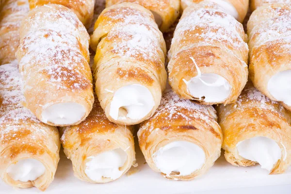 Tube of pastry filled with snow — Stock Photo, Image