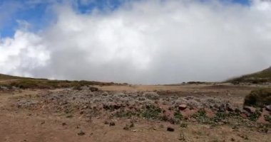 Drive in road to top of the Ethiopian Bale Mountains National Park. Ethiopia wilderness pure nature. Sunny day with blue sky.